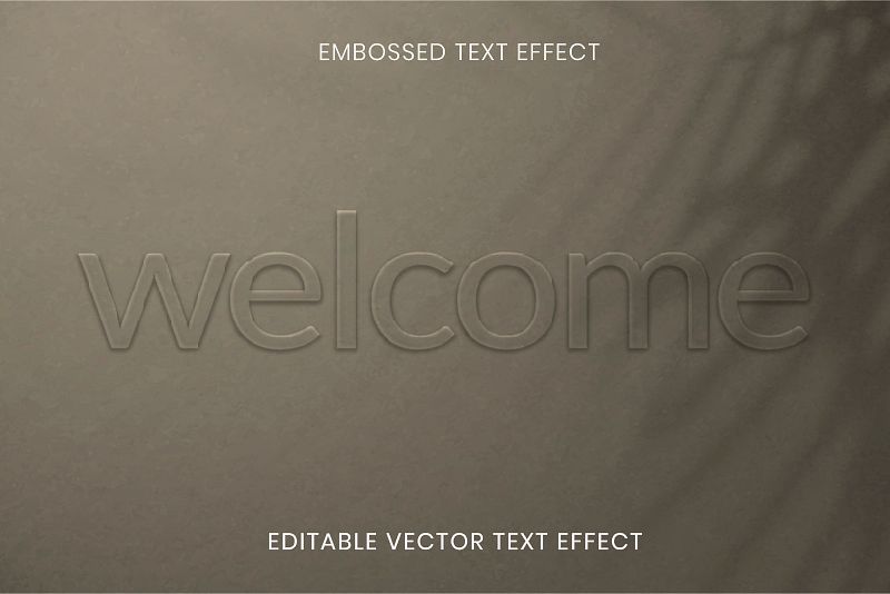 Embossed editable vector text effect on brown