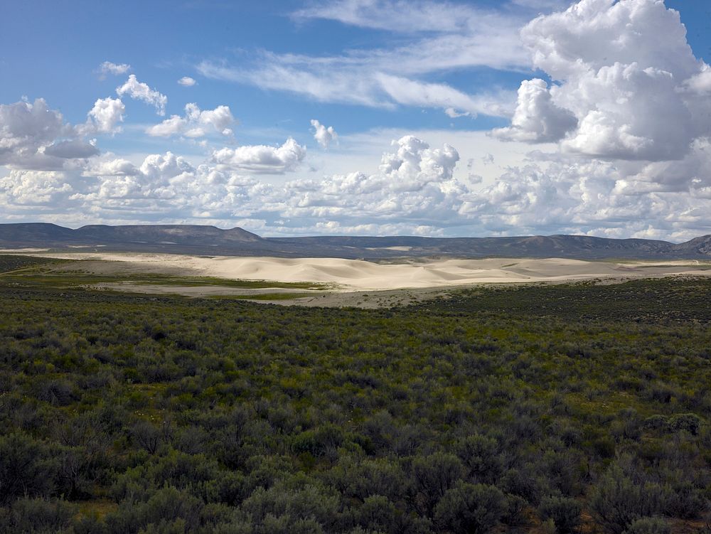 Distant view of the Kilpecker sand dunes and the forbidding Sweetwater County high-plains terrain in Wyoming.