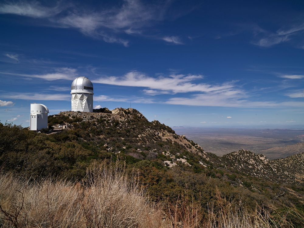 Some of several observatory buildings at the Kitt Peak National Observatory in the Quinlan Mountains in the Arizona-Sonoran…