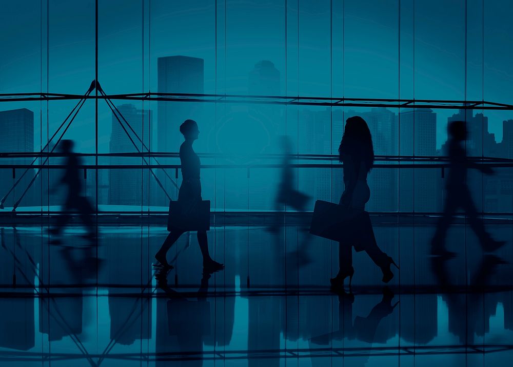 Silhouettes of business people walking