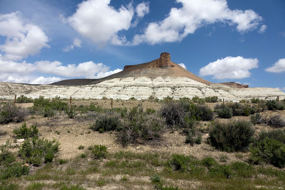 Castle Rock, a formation overlooking Green River, Wyoming, that has become a city symbol. Original image from Carol M.…