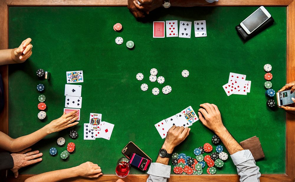 Group of people playing poker 