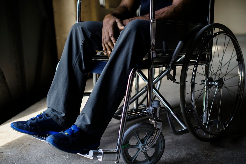 Disabled african man sitting on the wheelchair
