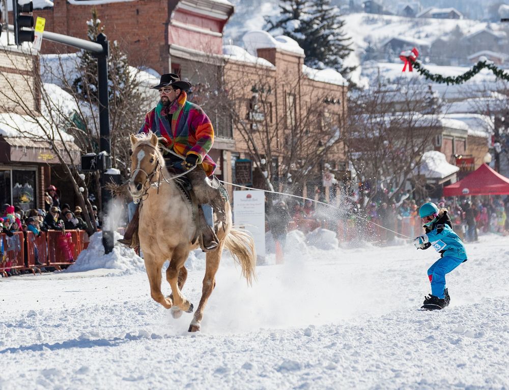 Action at a frigid street rodeo, part of the annual Winter Carnival in Steamboat Springs, Colorado. Original image from…