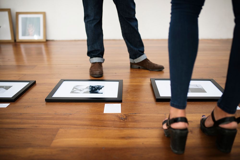 People attending an art exhibition