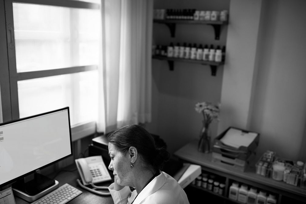 Doctor checking medicine stock