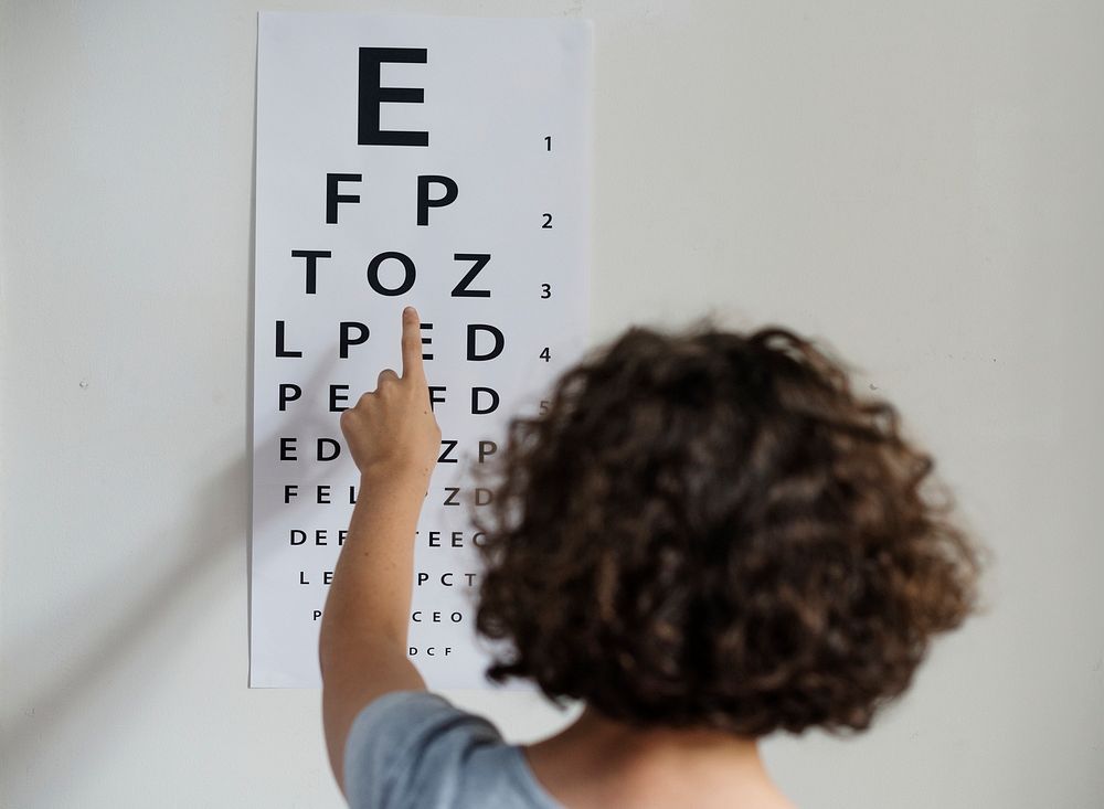 Young Caucasian girl getting eye examination