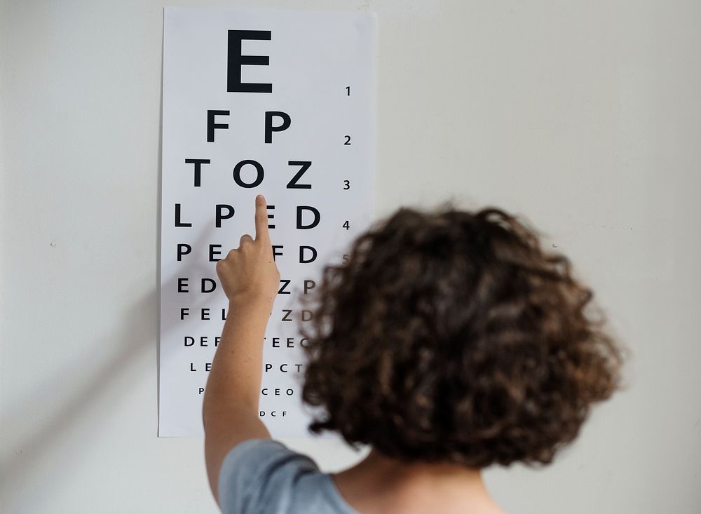 Young Caucasian girl getting an eye exam