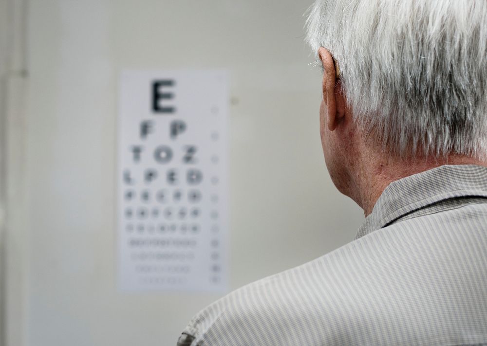 An elderly patient is having sight testing