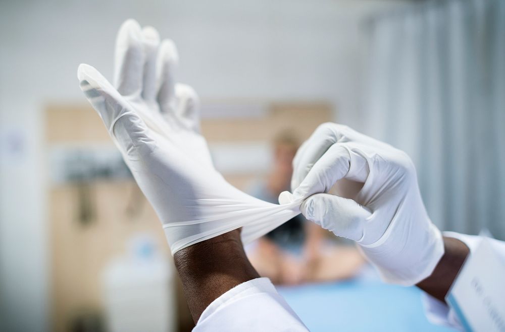 Doctor wearing gloves