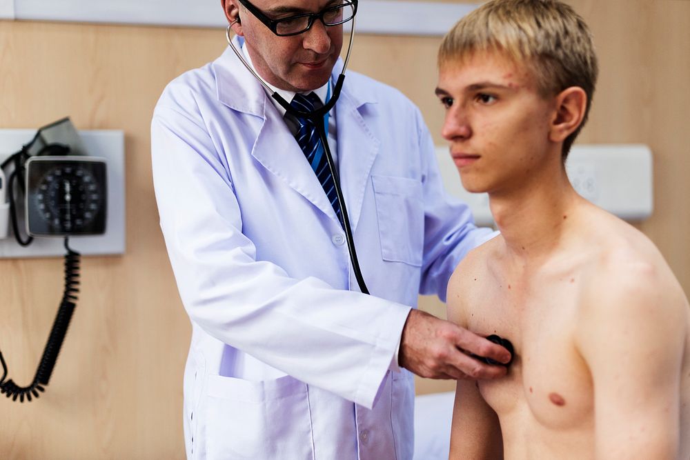 Young patient is getting a diagnose from doctor