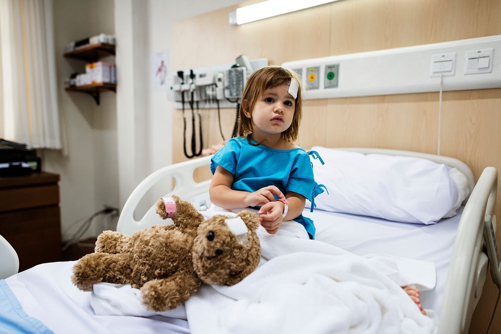 Sick little girl in a hospital