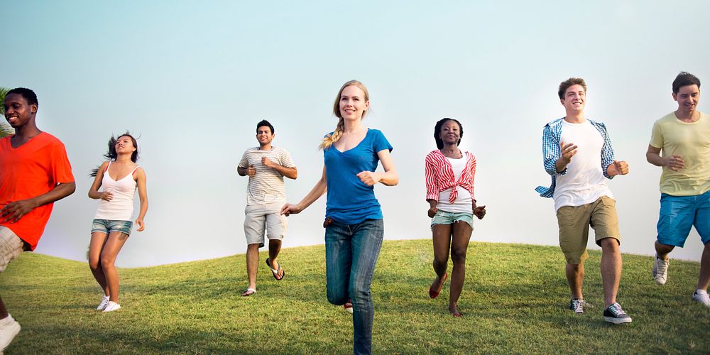 Happy diverse people jogging outdoors