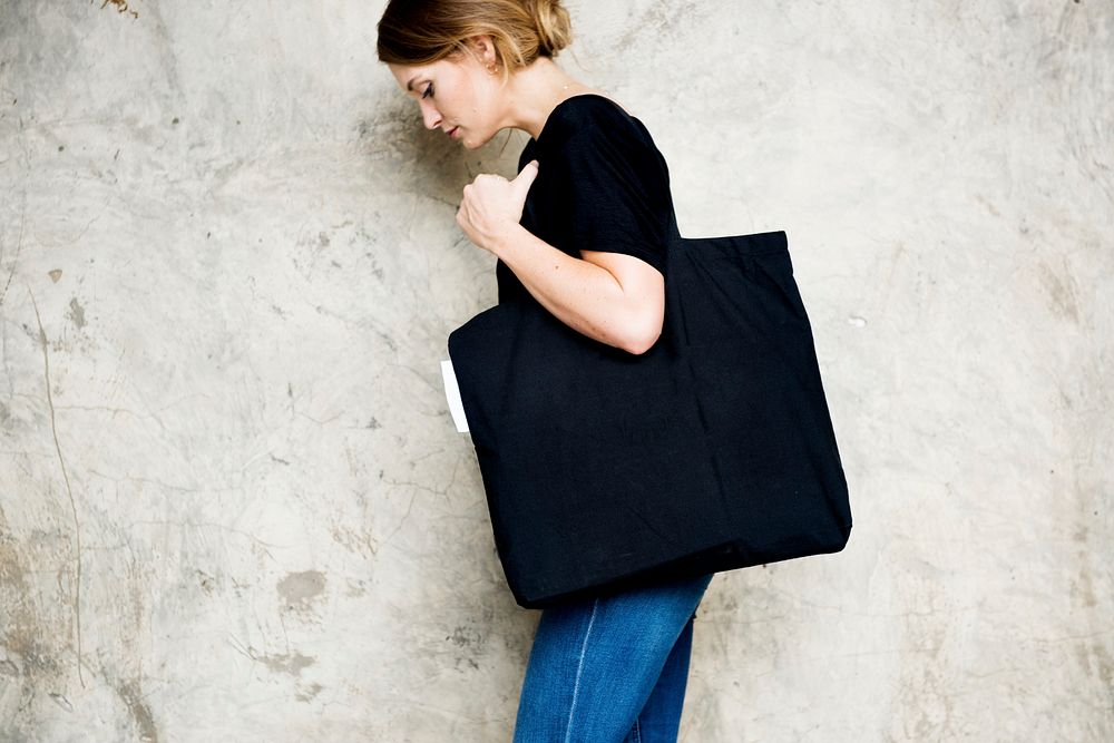 Woman carrying a tote bag