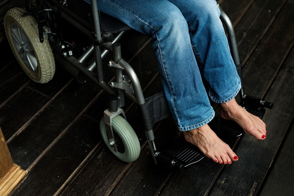 Handicapped woman sitting on a wheelchair