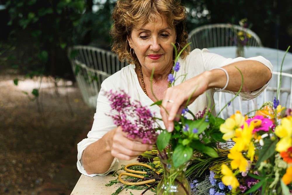 Woman arranging some flowers