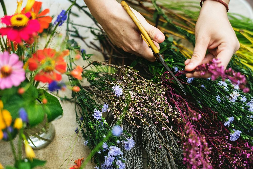 Woman arranging and decorating flowers