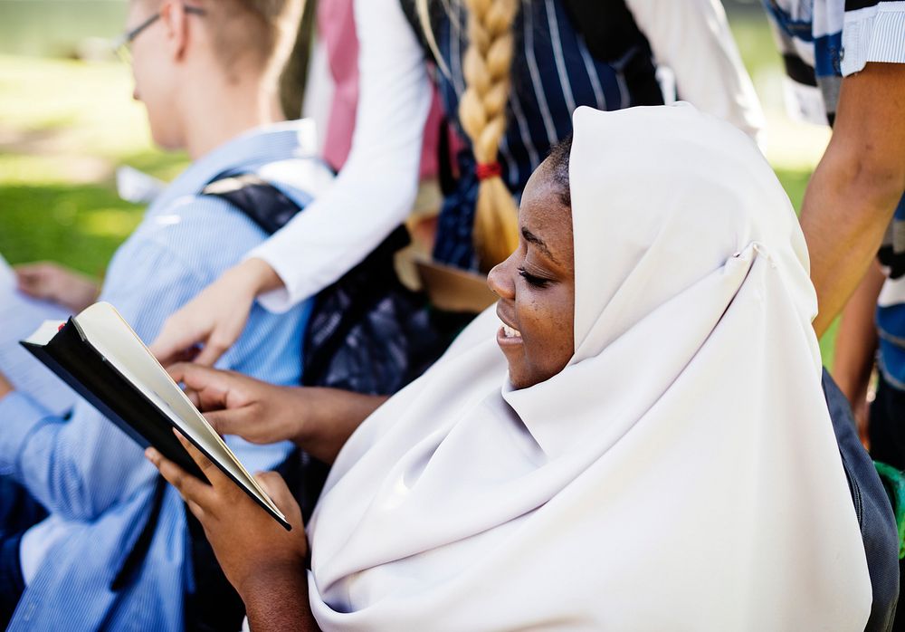 Diverse children studying outdoor