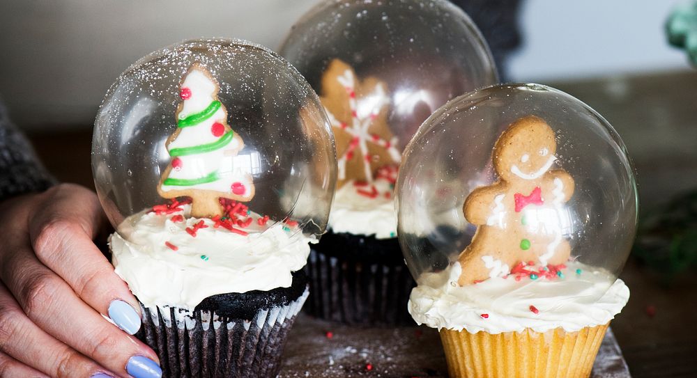 Set of Christmas cupcake snow globes