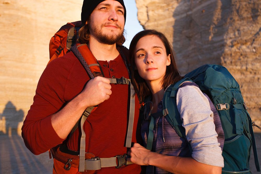 Couple hiking together in the wilderness