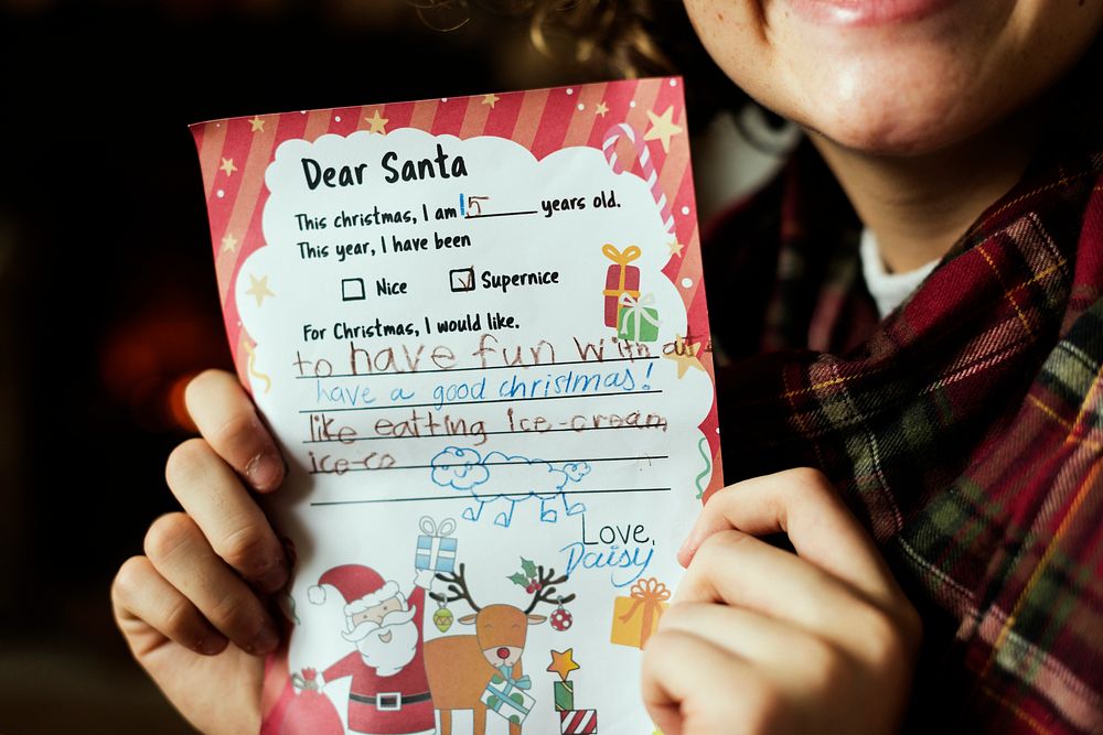 Kid with Christmas wish list