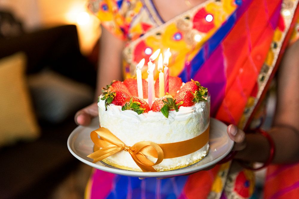 Indian family celebrating a birthday party