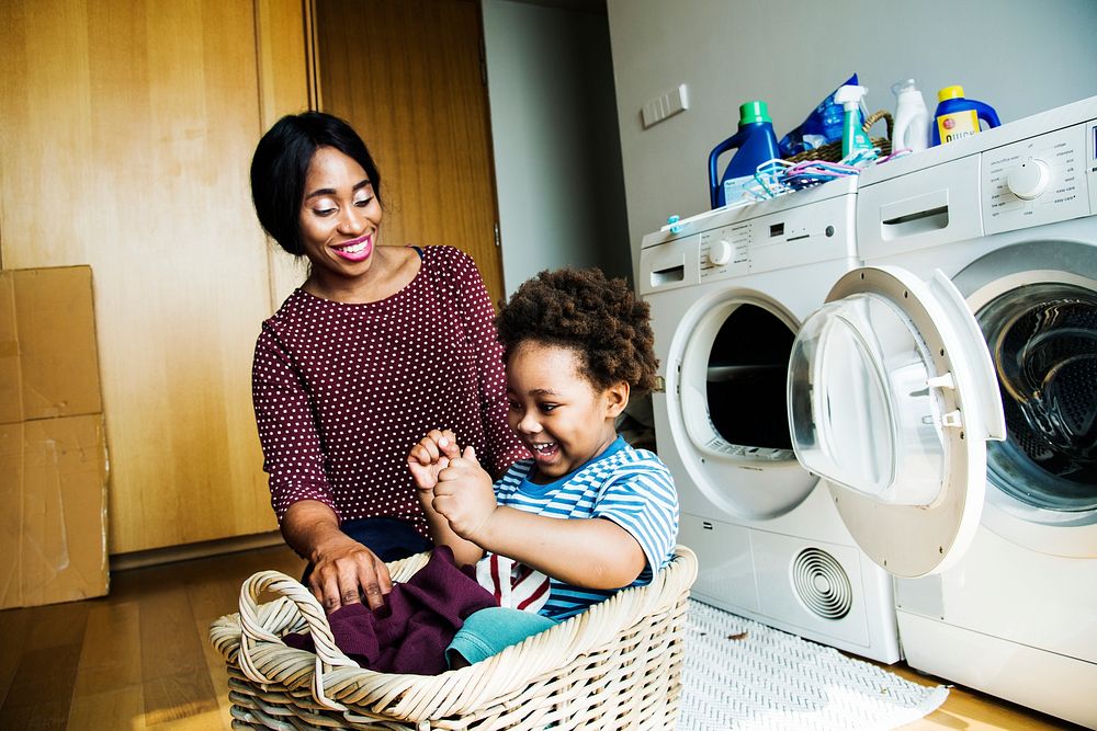 Mother and son doing housework together