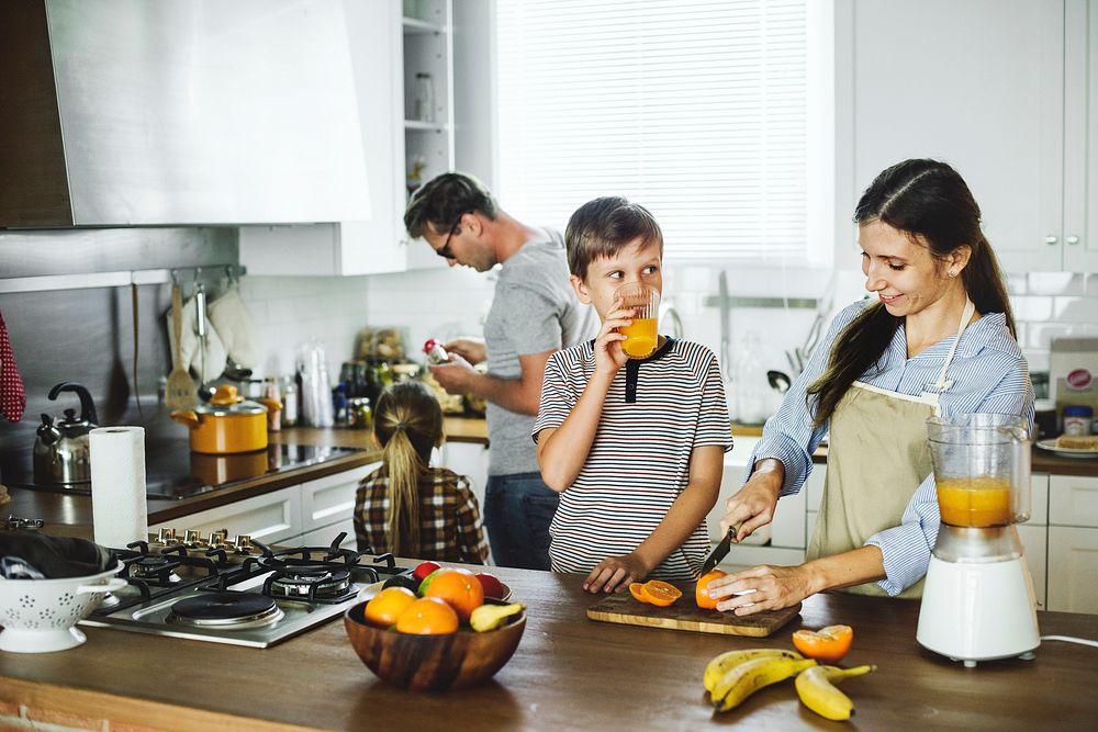 Family together in kitchen