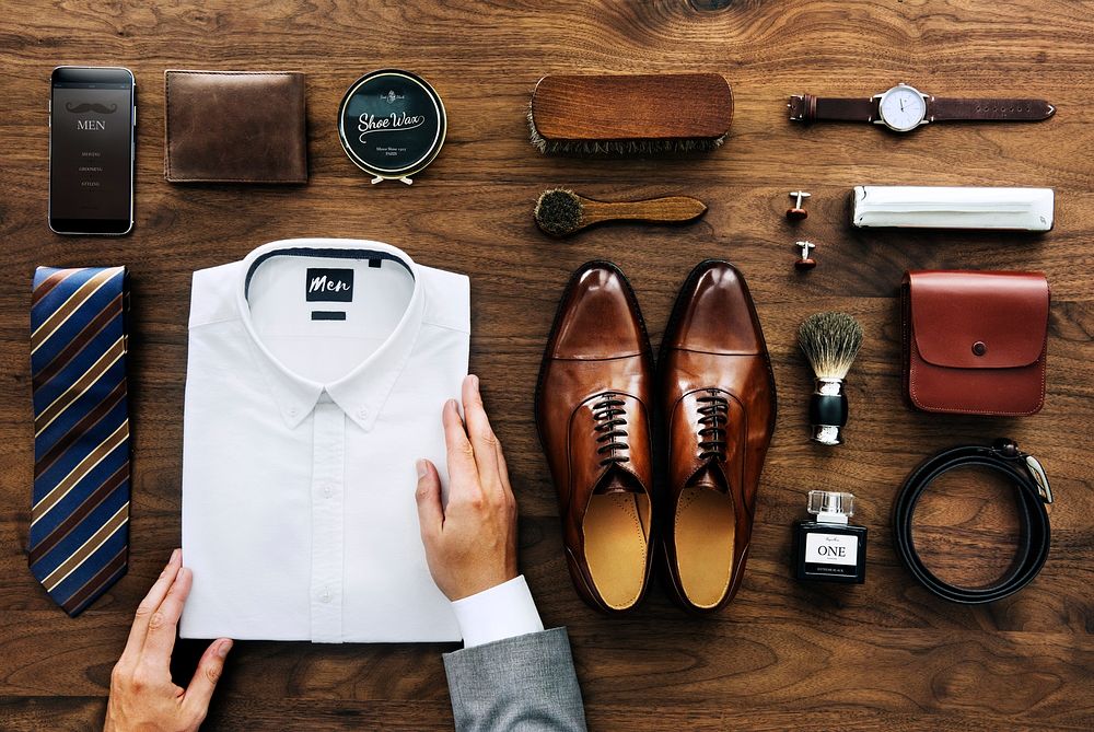 Flatlay view of a businessman arranging his belongings