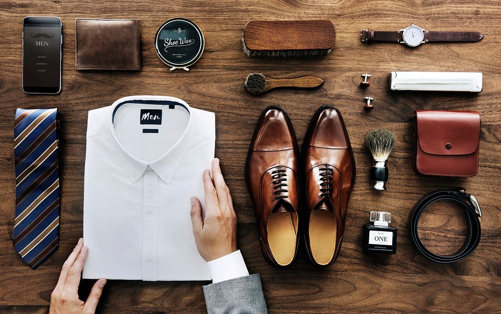 Flatlay view of a businessman arranging his belongings