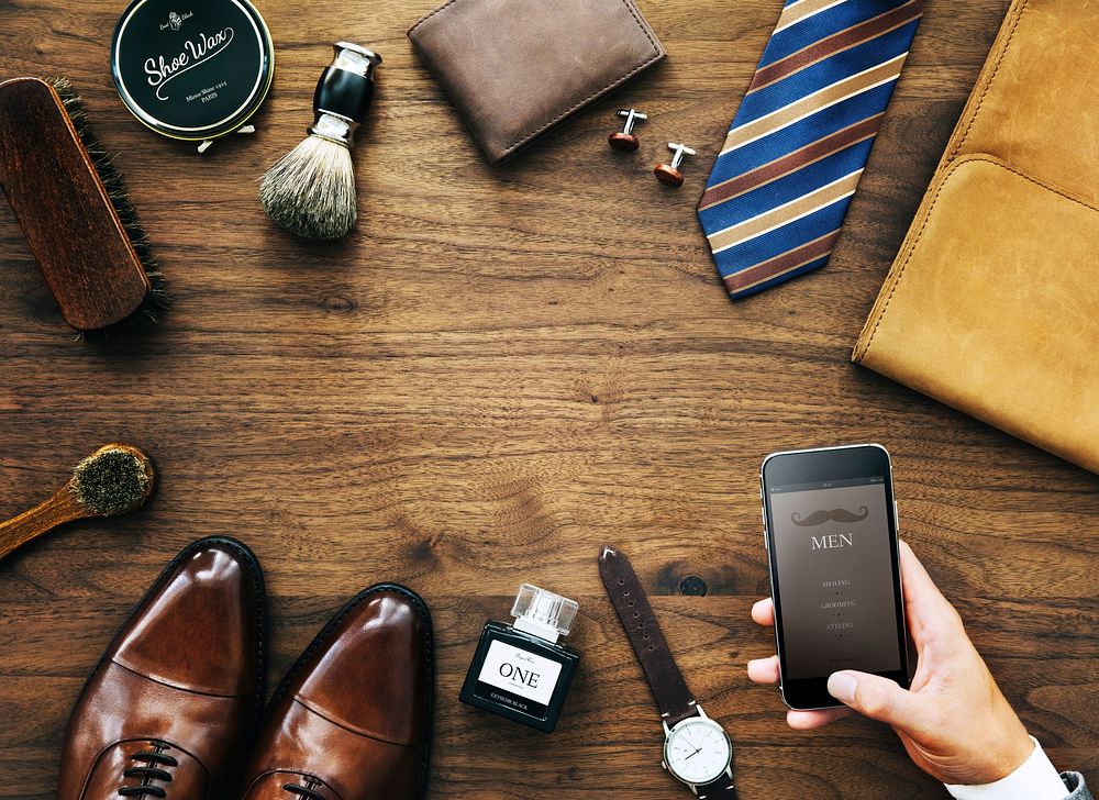 Flatlay view of a businessman's collection of objects used daily