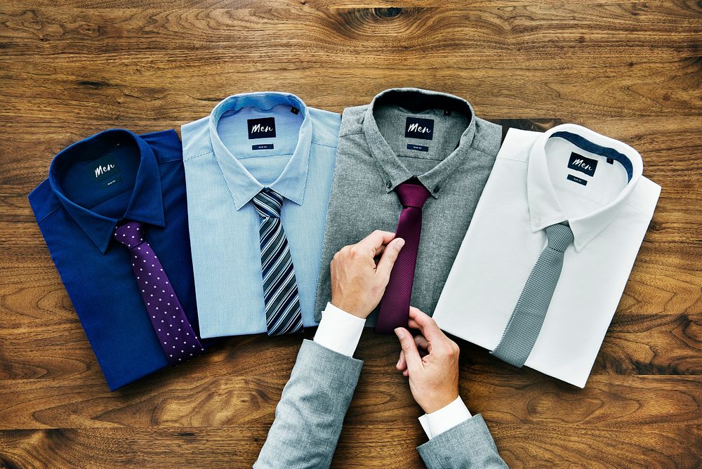 Businessman arranging his formal wear