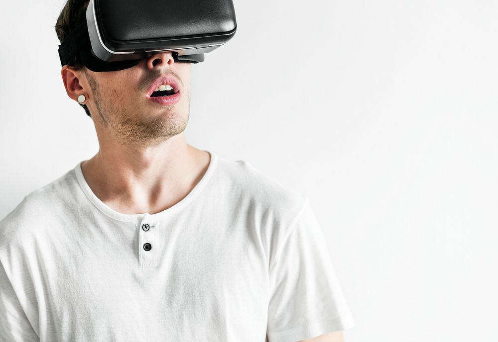 White man wearing virtual reality headset