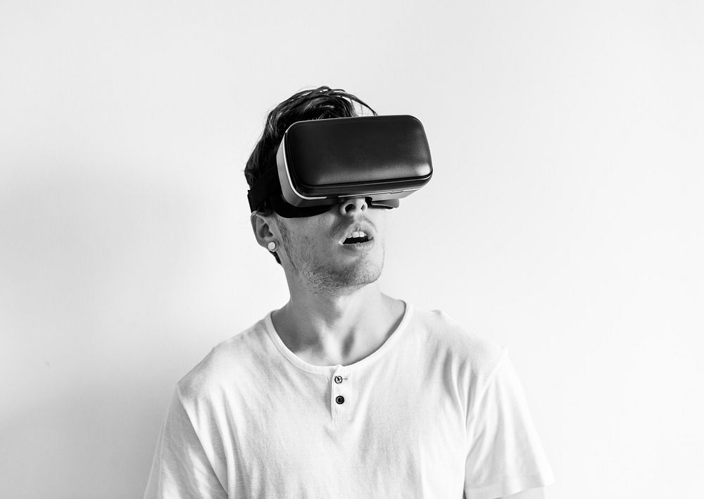 White man wearing virtual reality headset