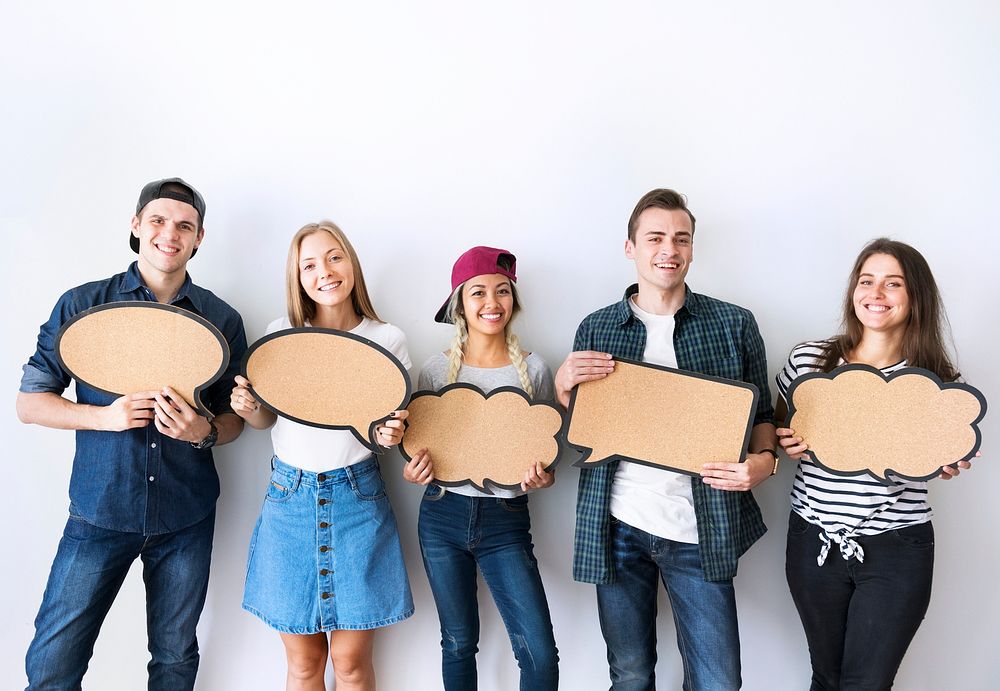 Happy young adults holding up copyspace placard thought bubbles