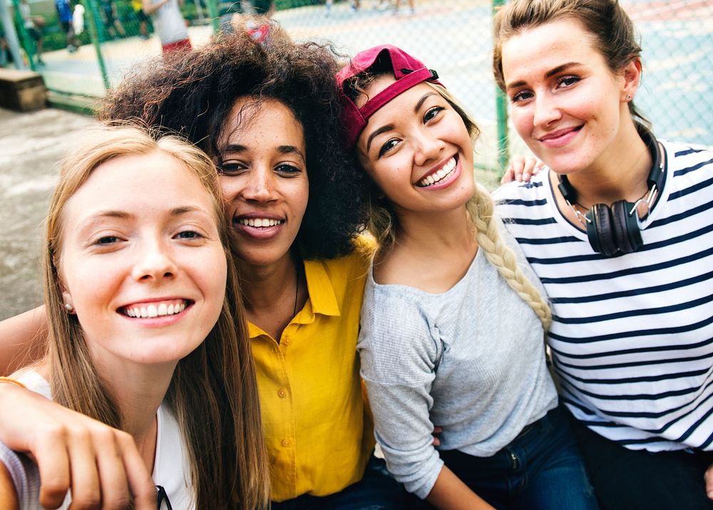 Multinational girl friends in the park selfie
