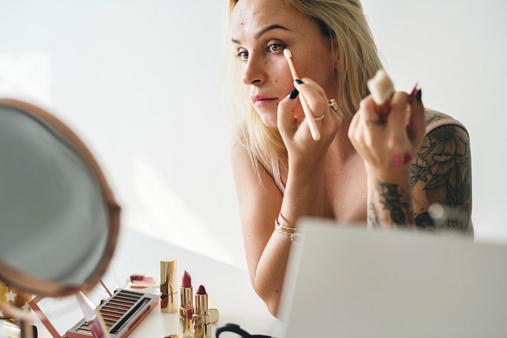 Beauty blogger doing makeup tutorial