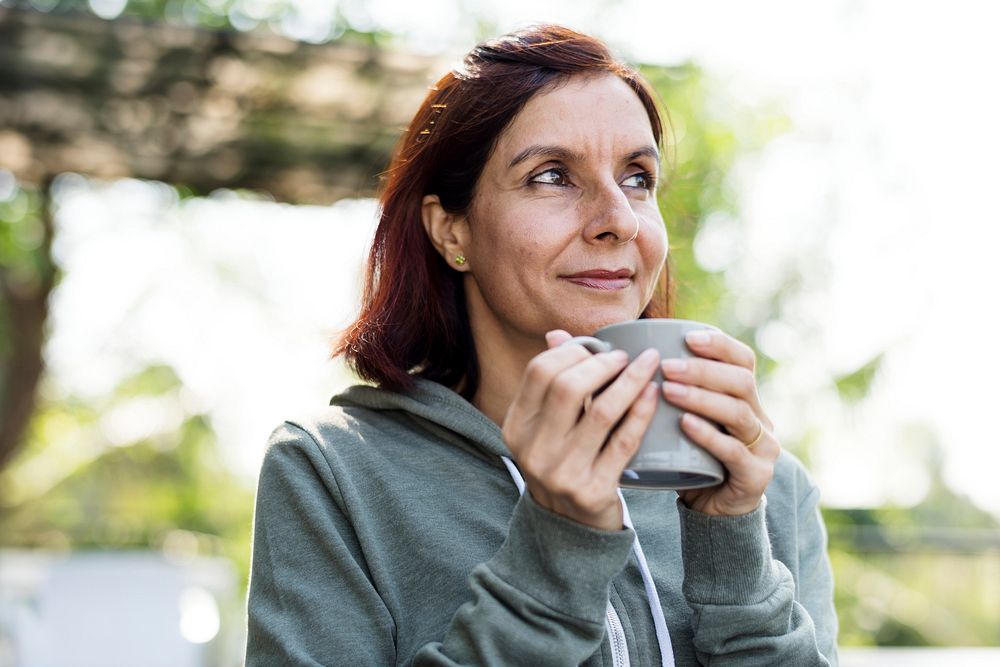 Woman having a mug of coffee