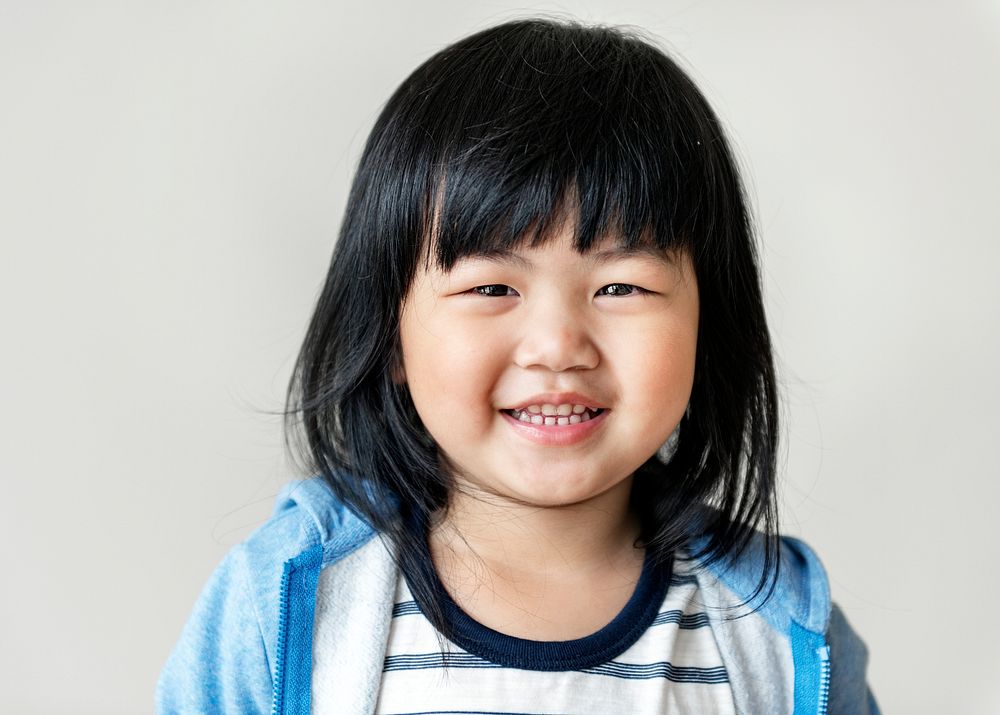 Portrait of cheerful Asian girl