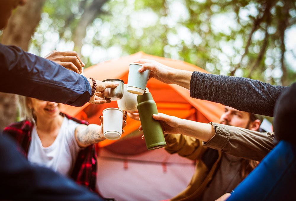Friends camping in the forest together