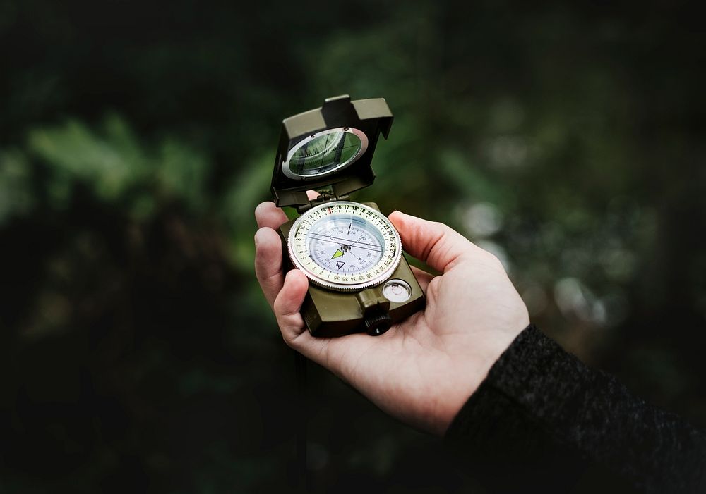 Trekking in a forest using a compass