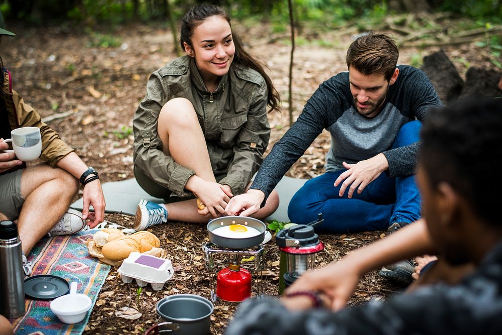 Friends camping in the forest together