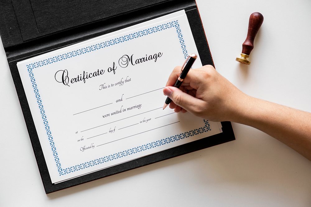 Hand signing on marriage certification