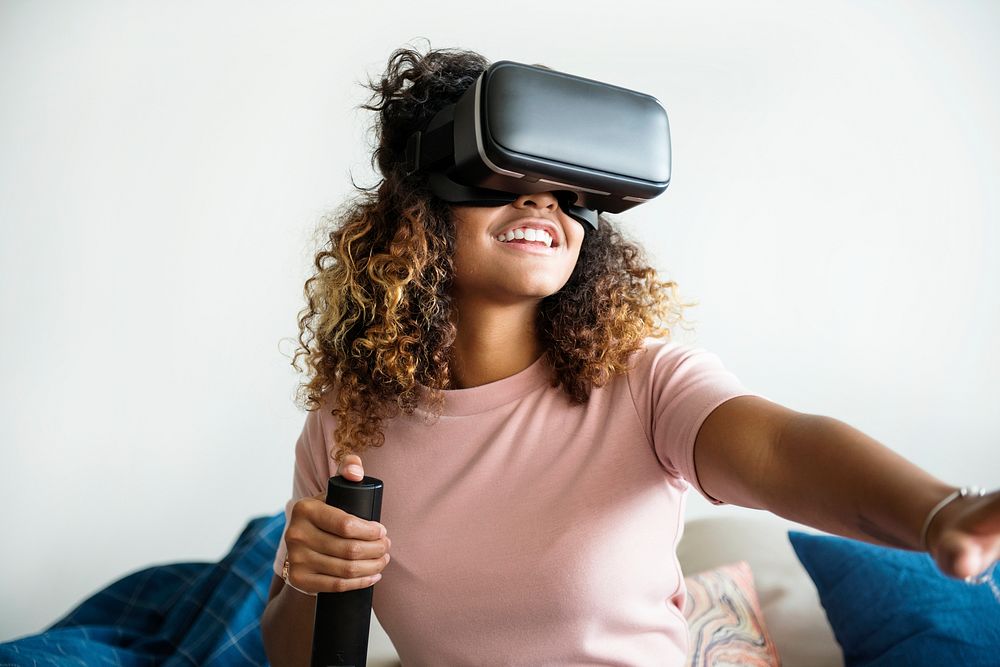 Black woman experiencing virtual reality with VR headset
