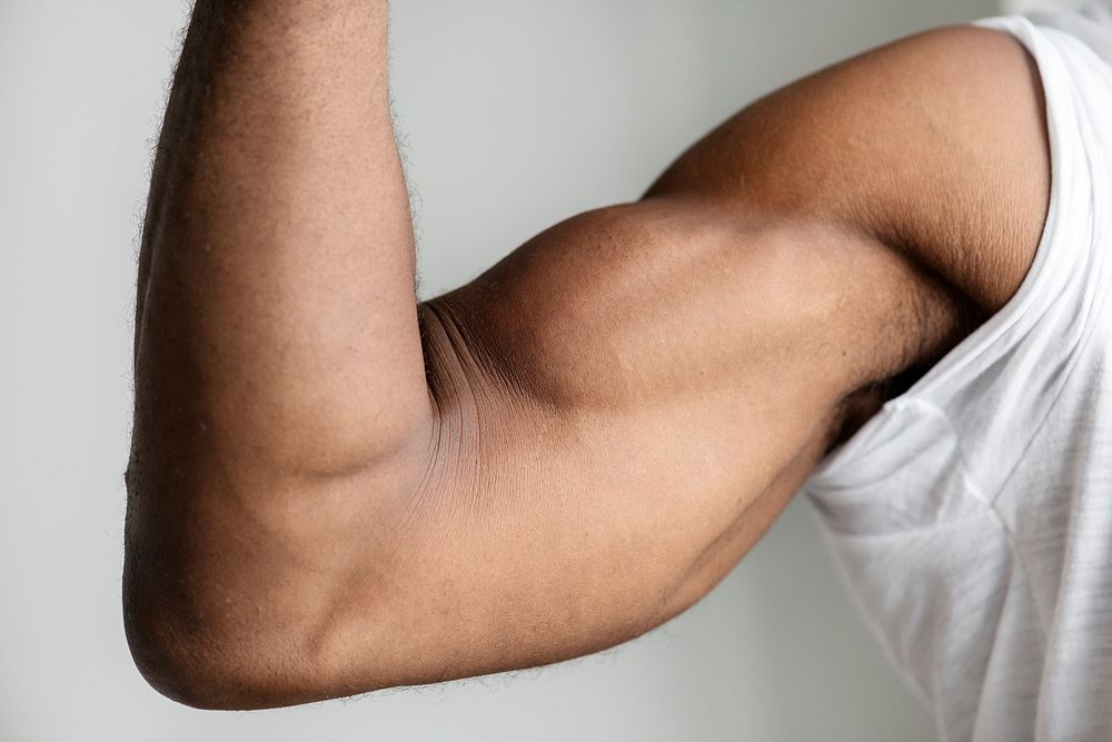 Closeup of a black person's muscular arm