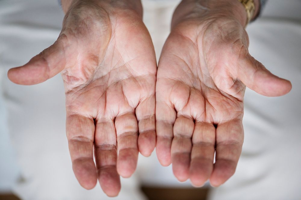 Closeup of elderly hand palms