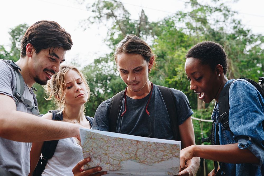 Group of friends looking at a map