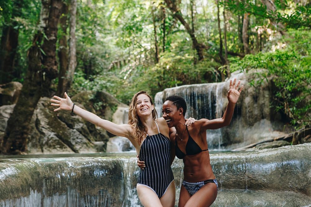 Friends having fun at a waterfall