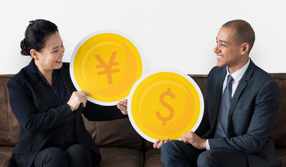 Business people with currency icons