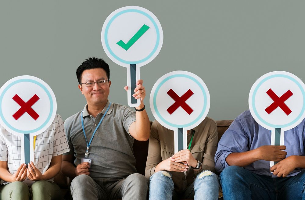 Group of people holding true & false icons